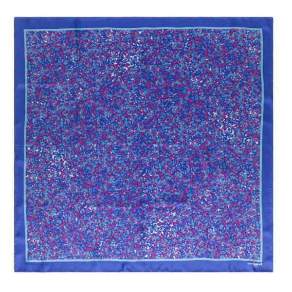 Blue scarf with a dense pattern of pink, purple, and white shapes, bordered in solid blue.