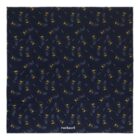 Navy blue scarf with small yellow floral pattern and cacharel logo at the bottom center.
