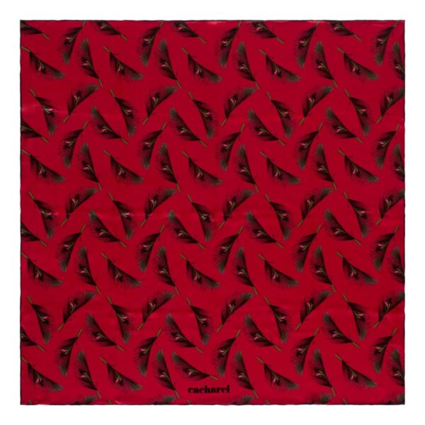Red scarf with a black feather pattern and the word cacharel printed at the bottom.
