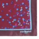 Maroon floral scarf with blue border and cacharel PARIS logo in the bottom right corner.
