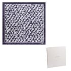 Navy blue and white patterned scarf with a matching white box.
