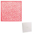 Red and white patterned silk scarf with a matching white box beside it.