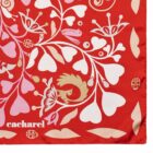 Red scarf with white and pink floral patterns, birds, and the word cacharel in white text.