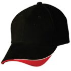 Black baseball cap with a red and white trim on the edge of the brim.
