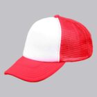 Red and white trucker hat with a mesh back on a plain gray background.