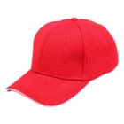 A plain red baseball cap with a curved brim and white trim on the edge.