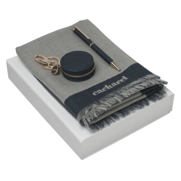 Gray Cacharel scarf, pen, and round keychain pouch on a white box.