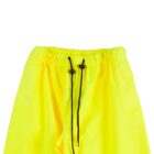 Close-up of bright yellow pants with black drawstrings and visible pockets.