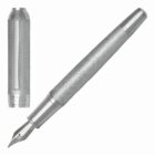 A silver textured fountain pen with its cap placed beside it.