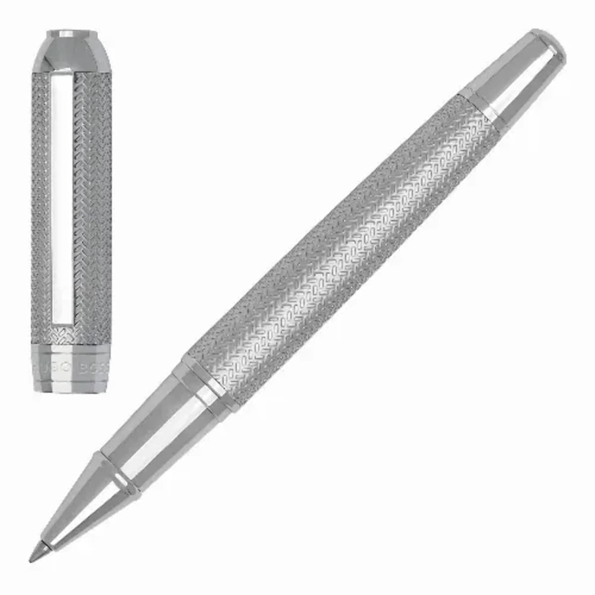 Silver textured pen with matching cap, both featuring sleek, modern design details.