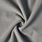 Light gray fleece fabric twisted into a spiral, showing its soft and textured surface.