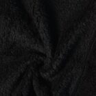 Close-up of black, textured, soft fleece fabric with visible folds and stitching.