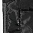 Close-up of the inside of a black jacket showing a zippered inner pocket and lining.
