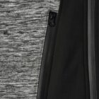 Close-up of a zippered pocket on a gray and black textured fabric garment.