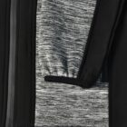 Close-up of a black jacket with a gray, striped inner lining and a visible zipper.