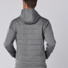 Man wearing a gray hooded jacket facing away, showing the back of the jacket.
