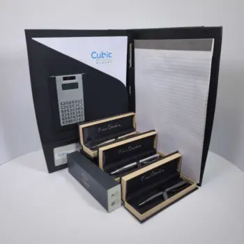 Black folder with calculator, notepad, and four pens—perfect for Promotional Xmas Gifts.