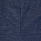 Close-up of a navy blue textured fabric with a visible seam running vertically.