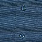 Close-up of a blue patterned shirt with two blue buttons visible.