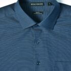 Blue slim fit dress shirt with a subtle dotted pattern and a front pocket.