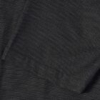 Close-up of dark gray fabric with a fine dotted texture and a pocket.