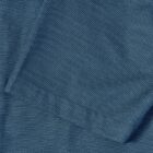Blue textured fabric with a folded edge, showing a subtle dotted pattern.