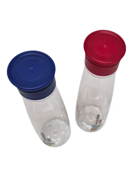 Two clear water bottles with blue and red lids