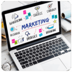 Laptop displaying marketing concepts like business goals, success, strategy, research, and branding.
