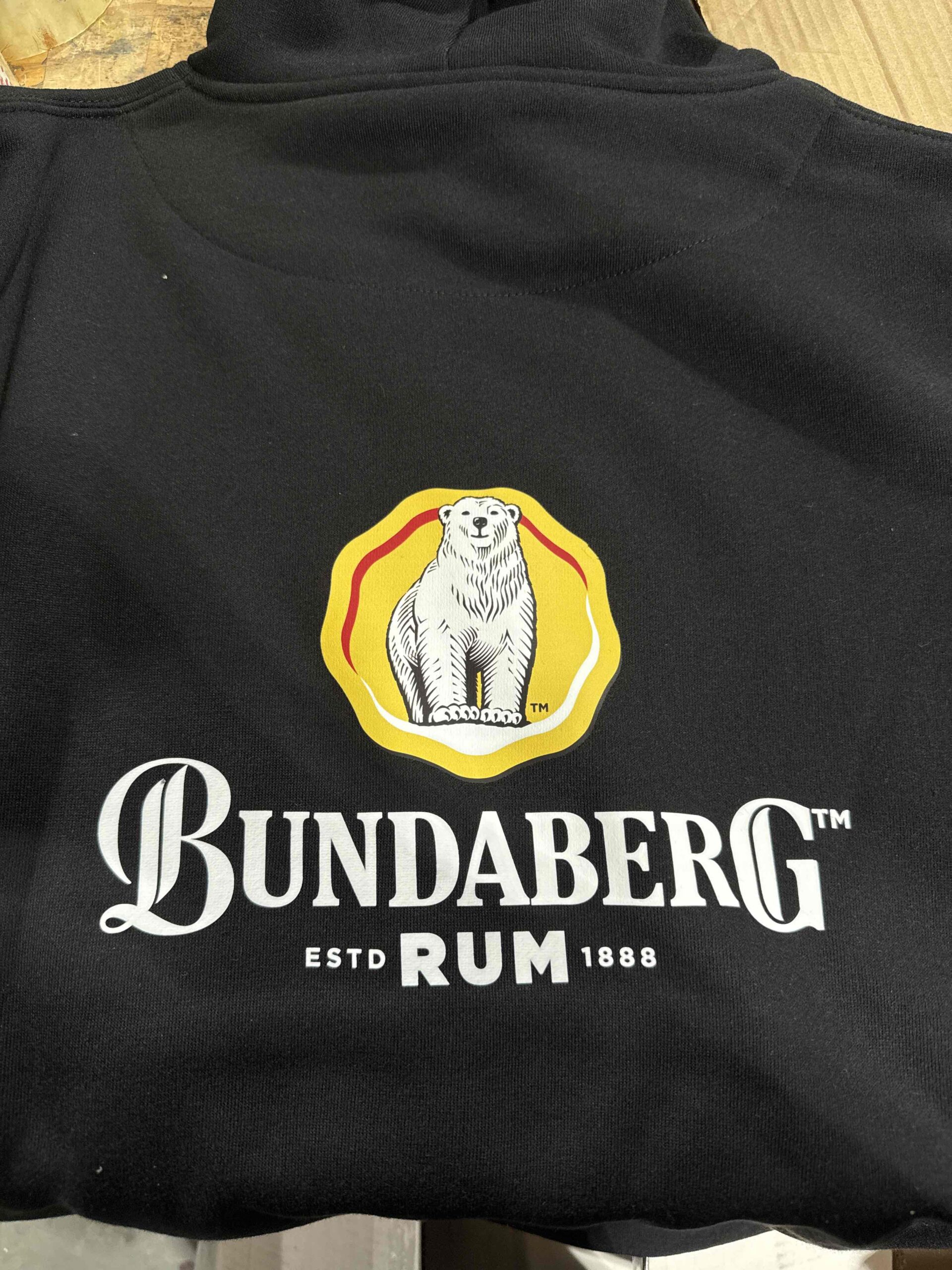 Black hoodie with the Bundaberg Rum logo and a polar bear above the text Bundaberg Rum.