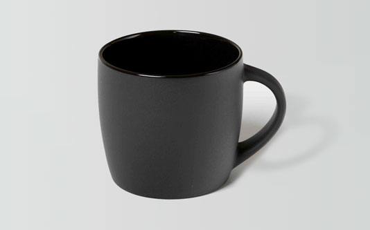 The Boston Matt Black ceramic mug with handle sits on a light gray background.