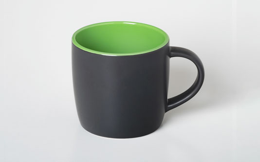 Boston Matt Black mug with green interior shown on a white background.