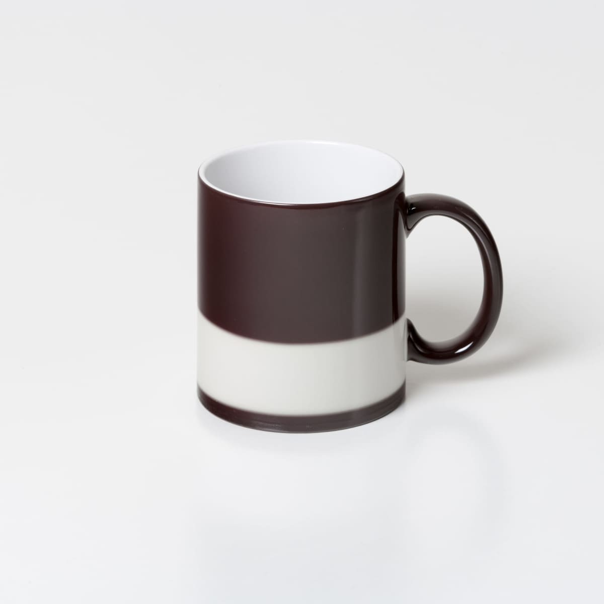 Magic Can Mugs Dye Sublimated with dark brown stripes and a white center.