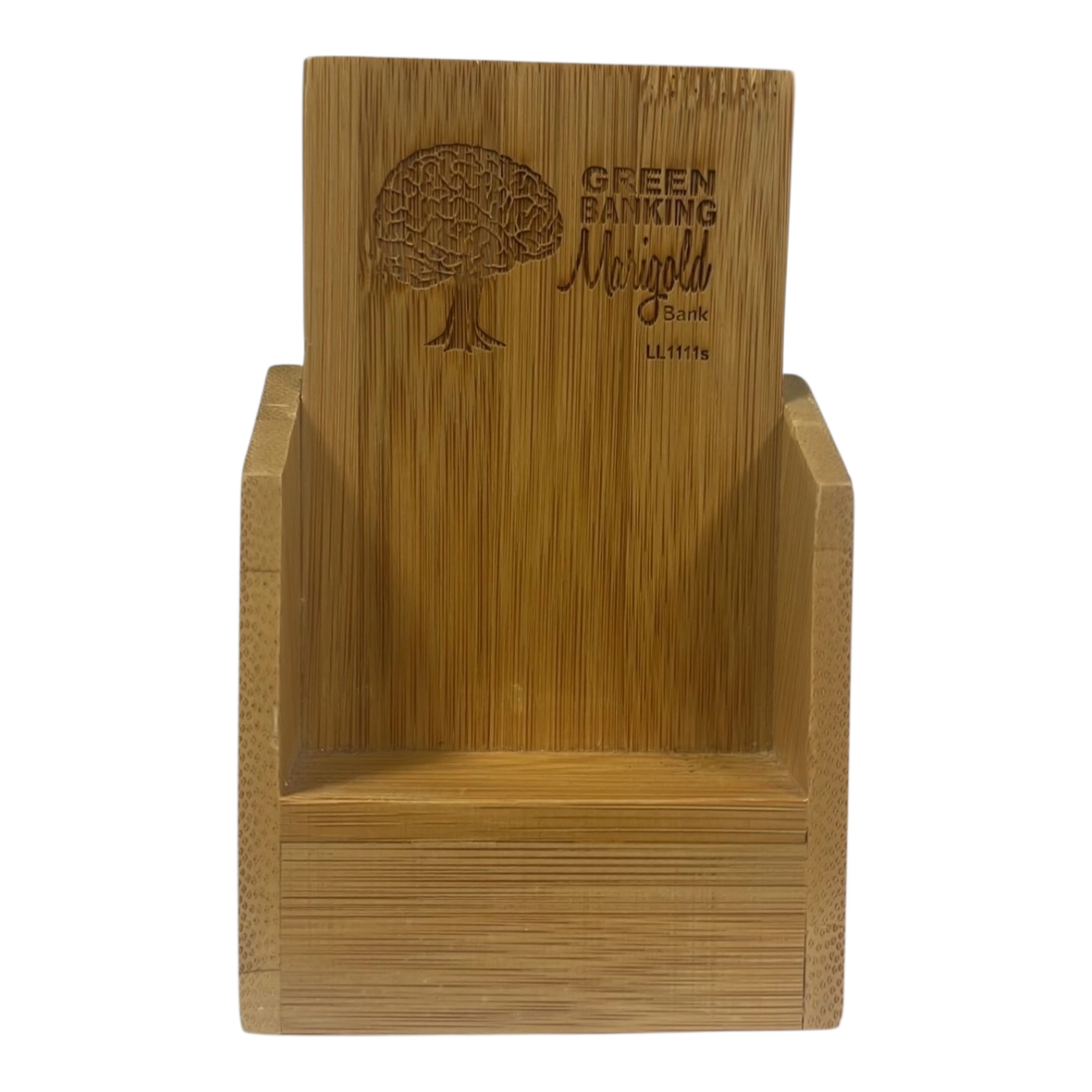 A bamboo phone stand, perfect for winning tradeshow giveaways, engraved with Marigold Bank.