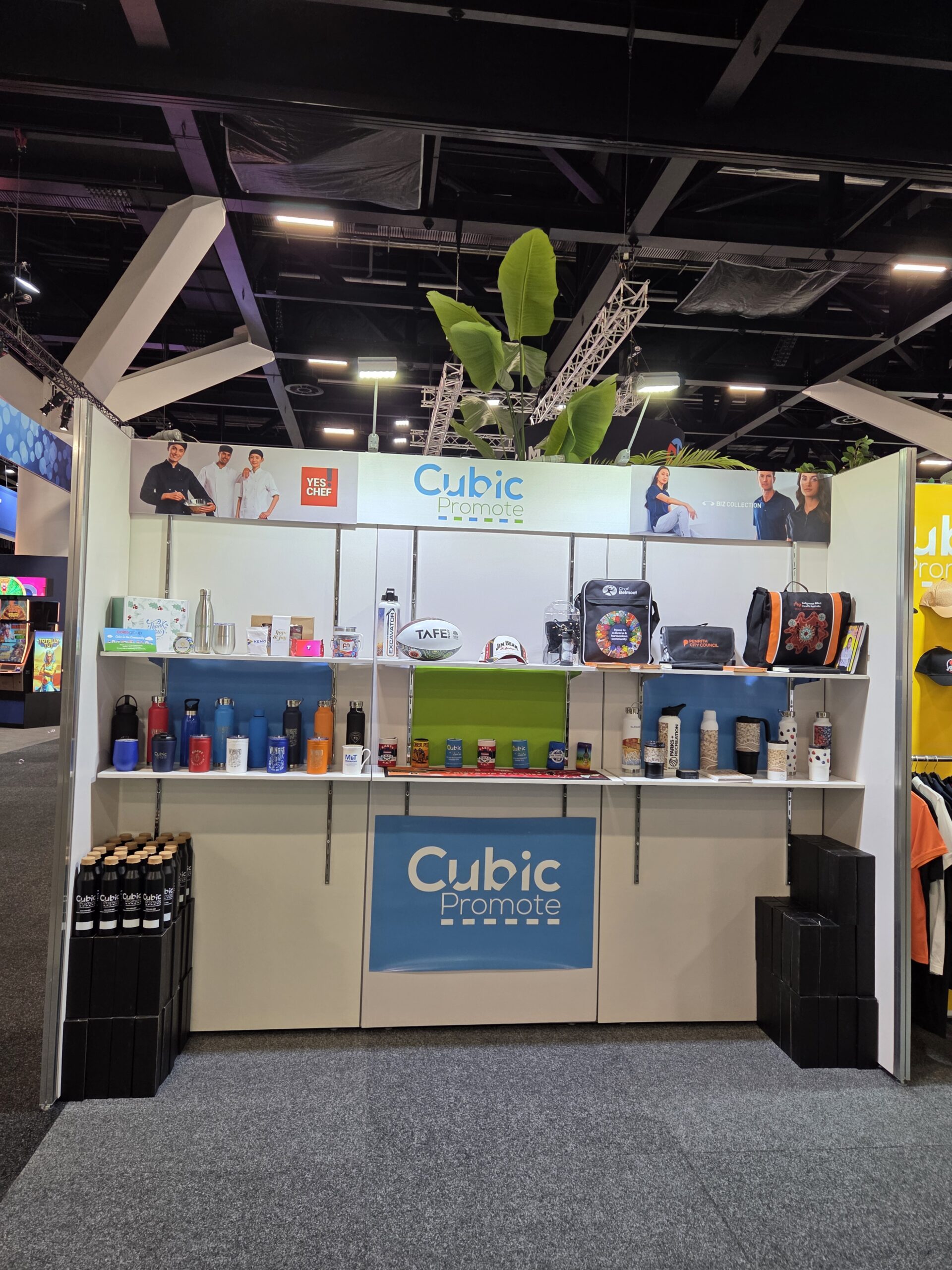 Trade show booth with Cubic Promote branding at the Australasian Gaming Expo.