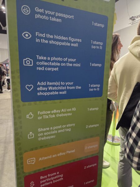 Colorful collectfest sign lists ways to earn stamps at the eBay booth, including social media tasks.