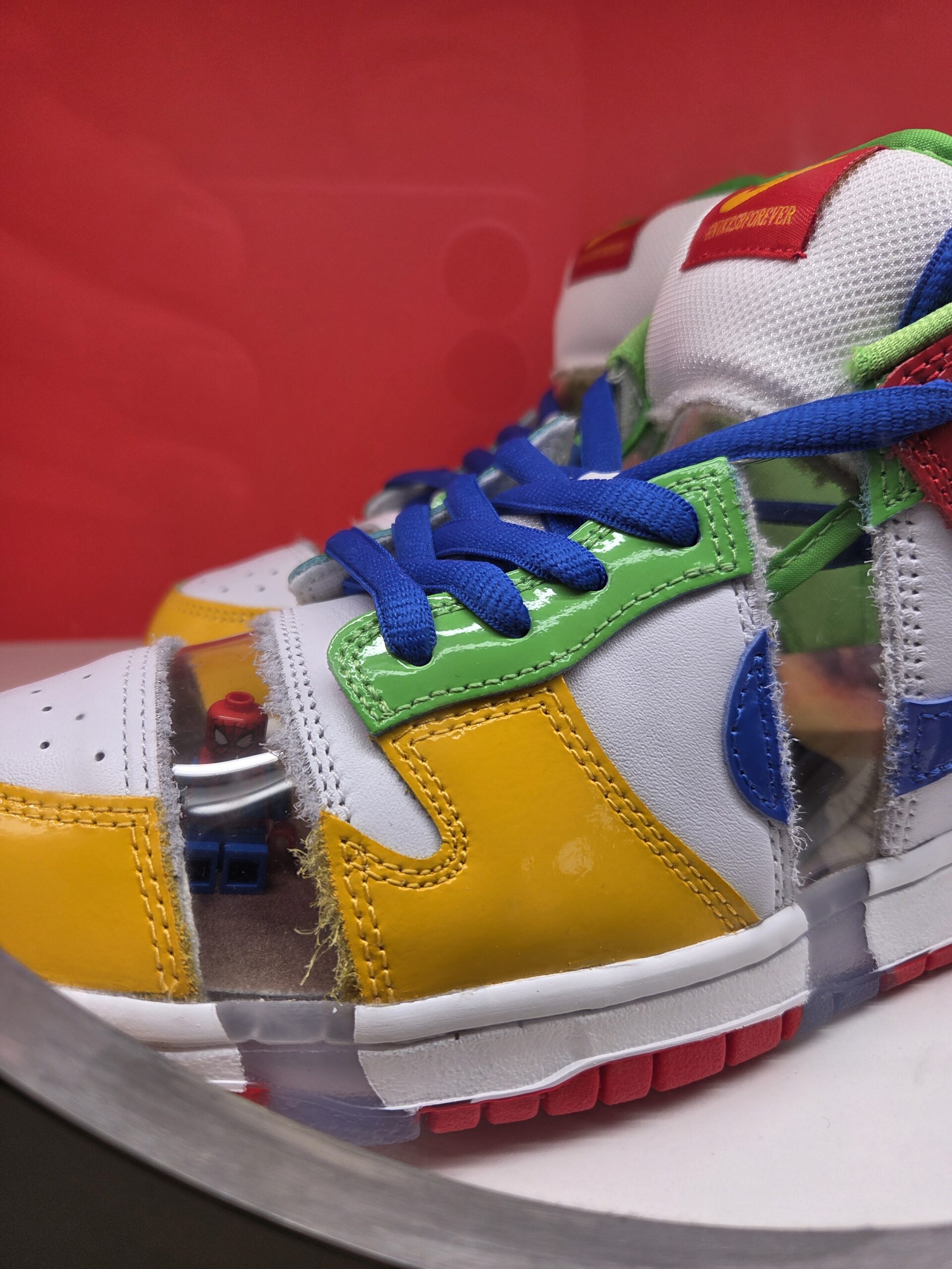 Close-up of custom-branded sneakers with blue laces, LEGO bricks inside—spot them at Collectfest Sydney 2025.