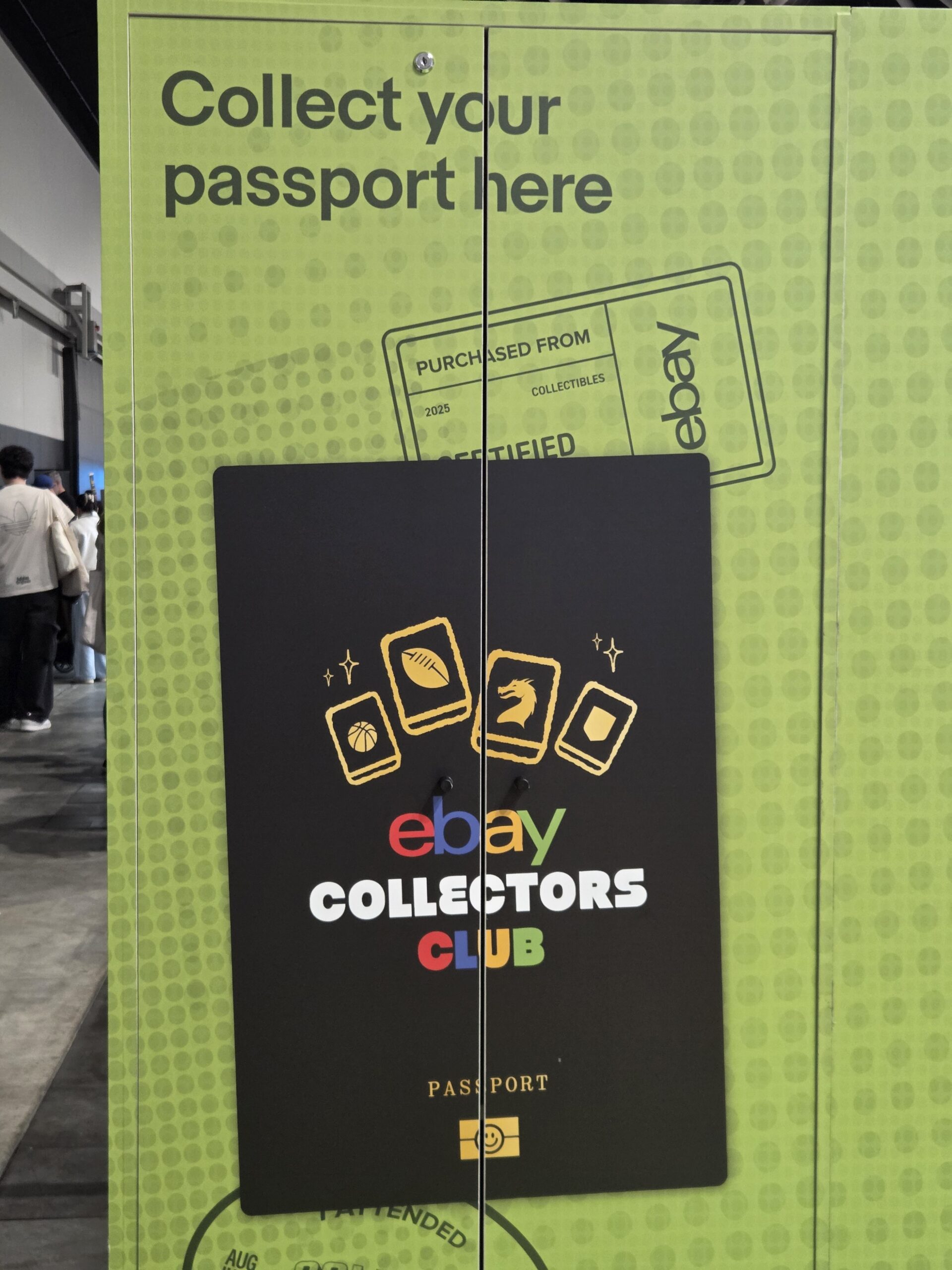 Green sign reads Collect your passport here with eBay Collectfest Sydney 2025 graphics and icons.