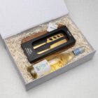 The Classic Pairing gift box includes a cheese knife set, wooden board, and white wine.