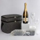 The Executive Celebration Hampers: Cooler bag, champagne, 2 glasses, and striped blanket.