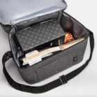 The Chandon Milestone Hampers: a grey cooler bag, wine, a gift box, and drink bottles.