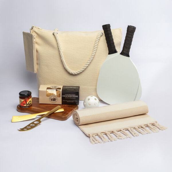 The Business Break Hampers: Tote, cheese board, crackers, jam, towel & pickleball paddles.