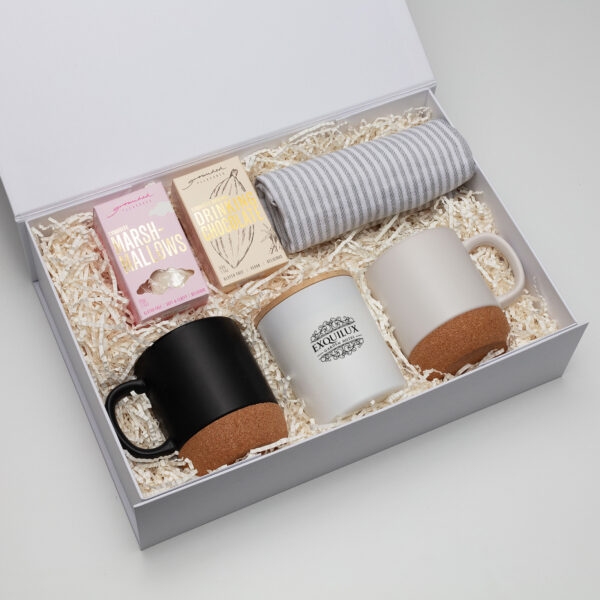 The Business Graze Sets gift box includes 3 mugs, marshmallows, chocolate, and a striped towel.