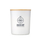 White candle with wooden lid from The Morning Ritual Hamper by Lila & Lily Fragrance Studio.