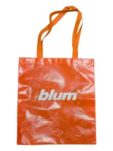 Orange tote bag printed with the white Blum logo on the front.