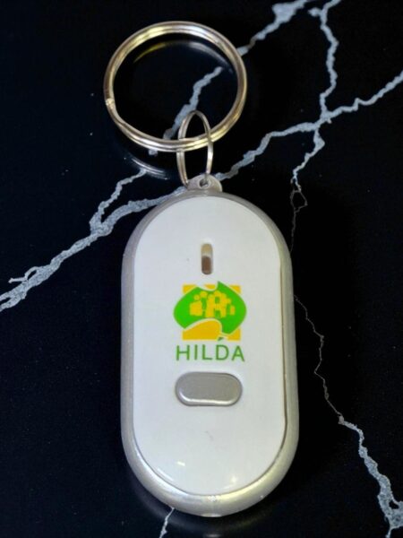 White keyring with HILDA logo 