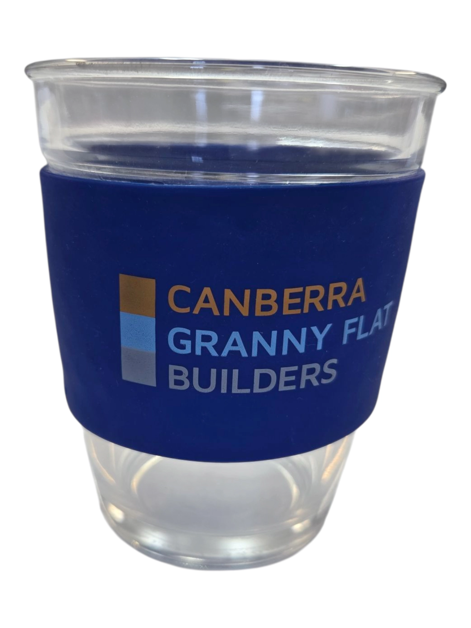 Clear cup with a blue sleeve, perfect for Small & Medium Businesses, reads Canberra Granny Flat Builders.