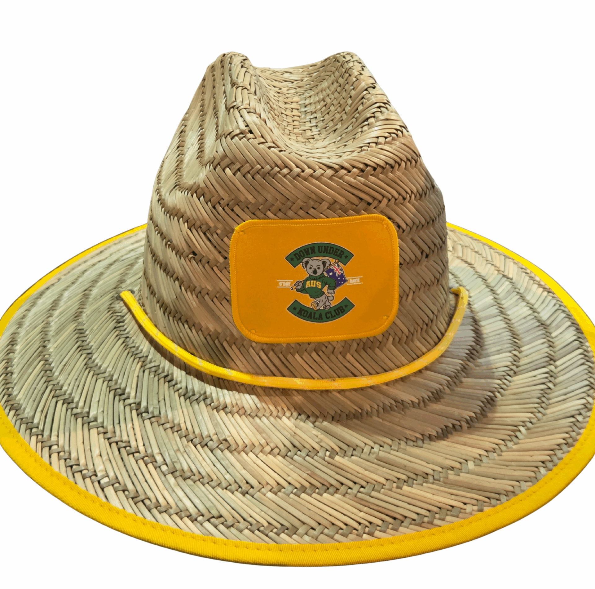 Straw hat with a yellow rim and a patch featuring the letter S and green graphics on the front.