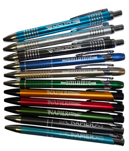 A stack of assorted plastic pens vs metal pens arranged in three rows on a white background.