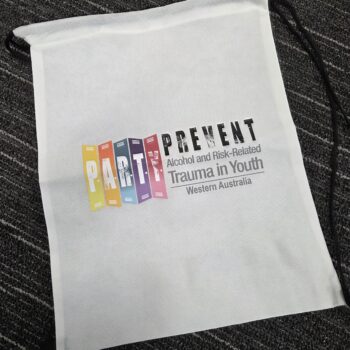 White drawstring bag with colorful PARTY PREVENT logo, promoting injury prevention awareness.