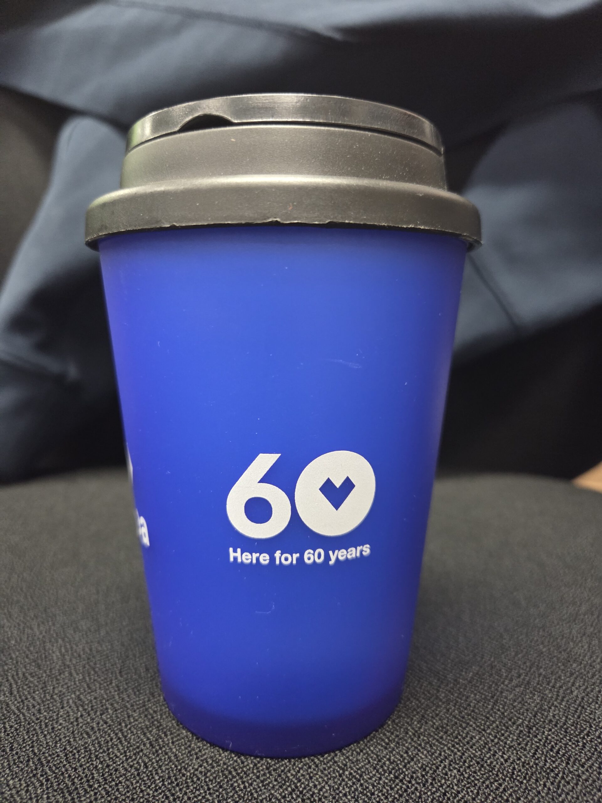 blue cup with dark grey lid